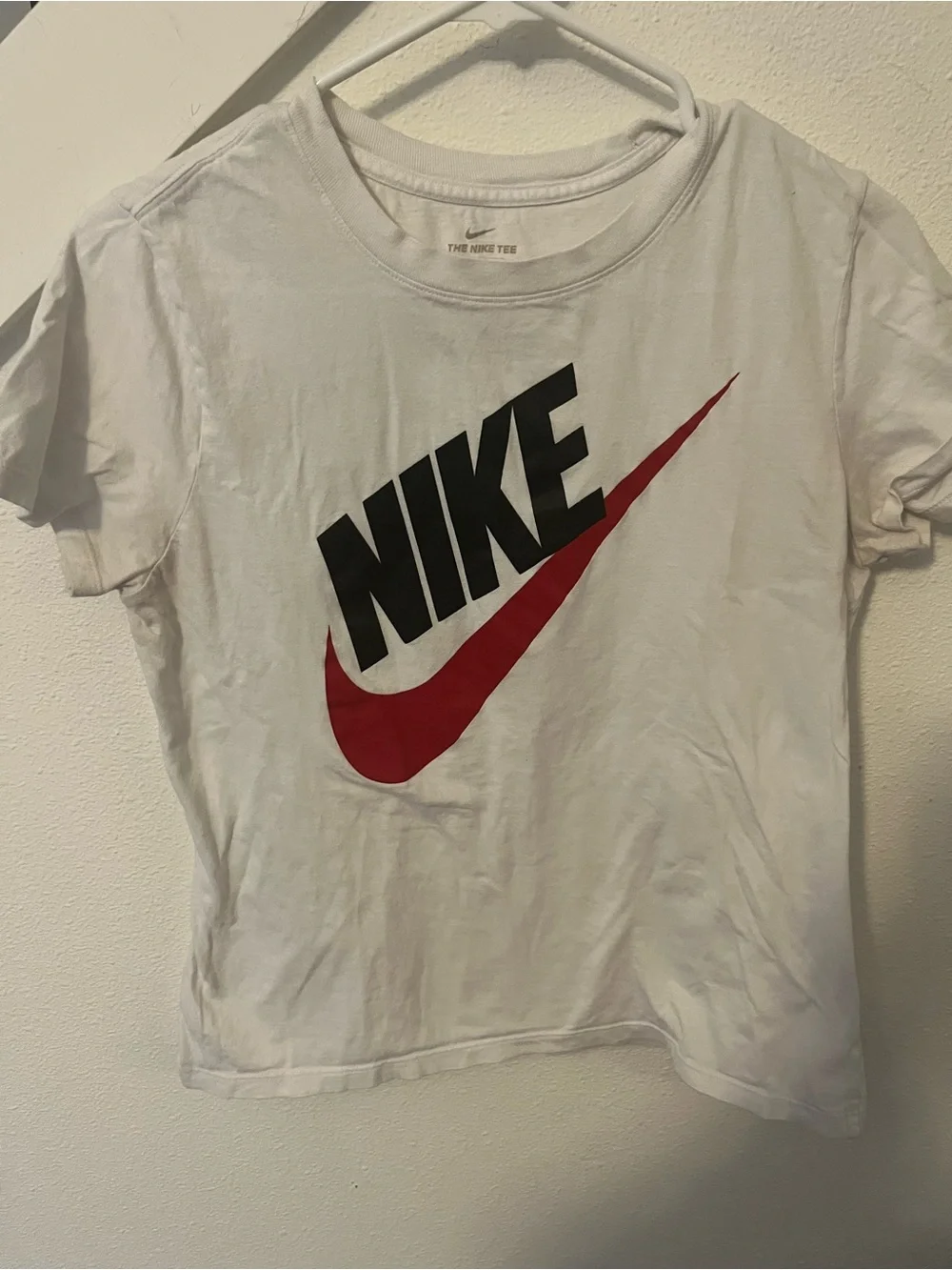 Nike White Short-Sleeve Tee with Red Swoosh and Black Logo